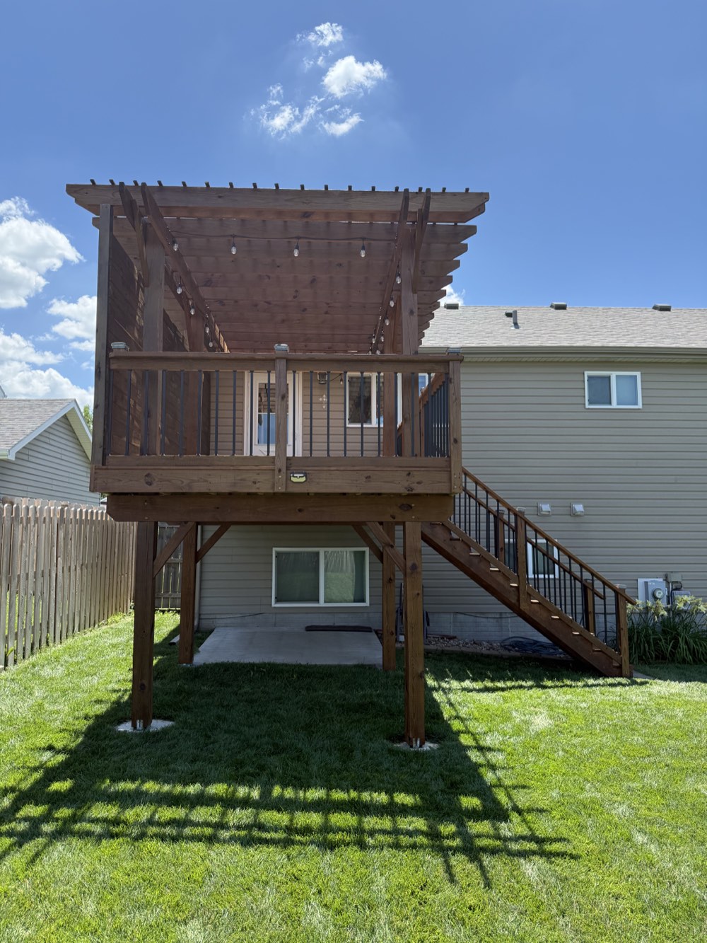 Newly stained elevated deck and pergola by LNK Painting
