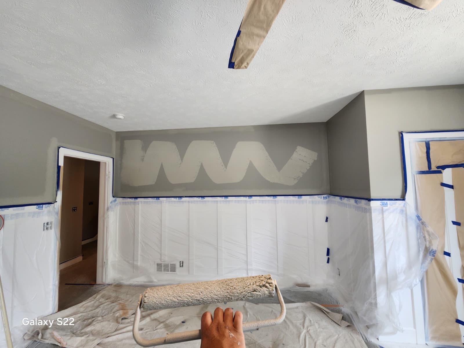 LNK Painting crew preparing and painting a new interior wall