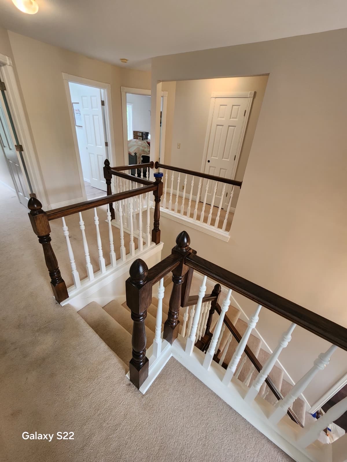 Completed interior walls, trim, and staircase by LNK Painting